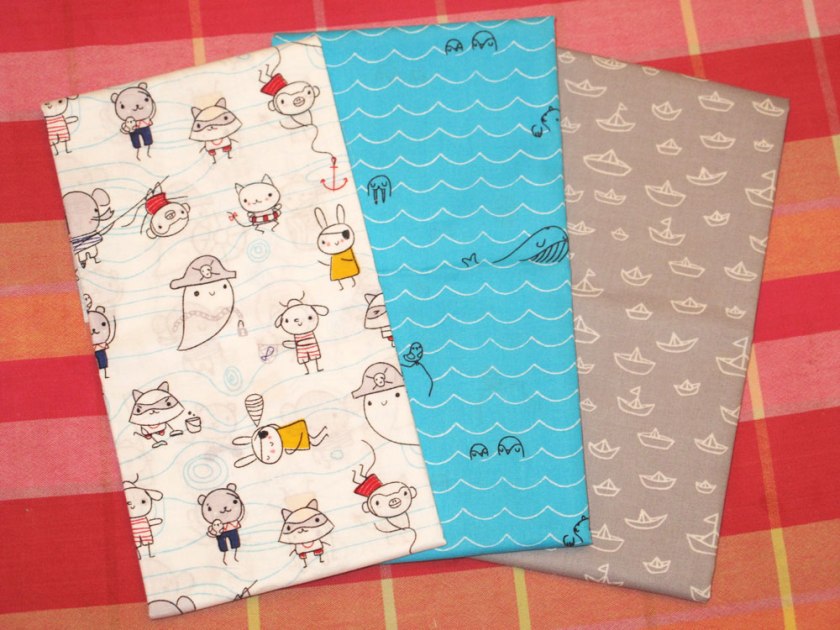Fun, fun, fun! These are organic cotton. It's Seven Seas collection by Michéle Brummer Everett for Cloud9 Fabrics. These prints are Sea Critters, Laddies and Poppets, and The Fleet in Grey.